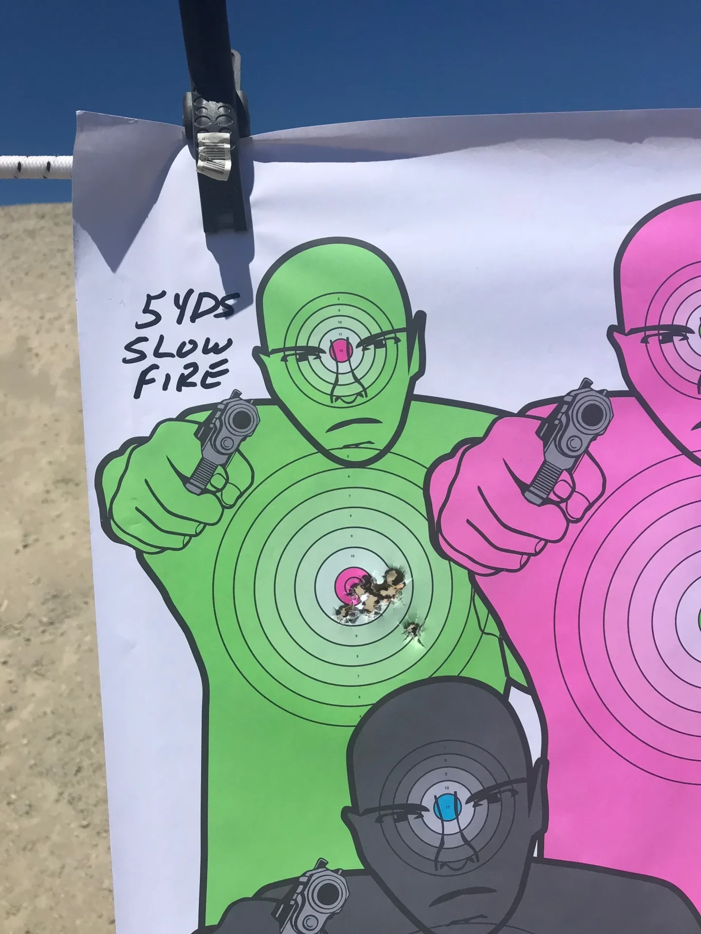 A man and woman are holding guns in their hands.